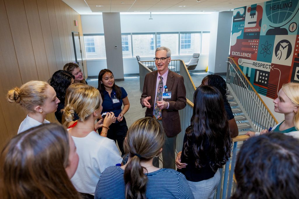 Attendees mingle with Dr. Karon during the Mayo Clinic School of Health Sciences (MCSHS) Career Immersion Program.