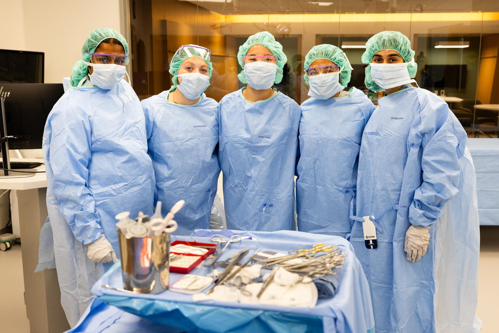 Students pose for a photo in a surgical simulation activity during the Mayo Clinic School of Health Sciences (MCSHS) Career Immersion Program. This is the 10th Anniversary of the 4-day immersion program for high school students.